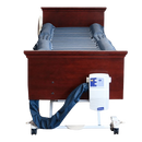 Front Centered View Of The Joerns DermaFloat LAL Low Air Loss Mattress System Shown On An Adjustable Hospital Bed With The Control Unit Attached To The Footboard