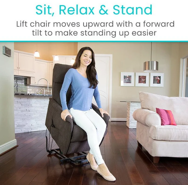 Front Centered View Of The Vive Health Lift Chair Shown In The Lifted Position With An Attractive Woman Exiting The Chair In A Living Room Setting