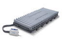 Front Centered View Of The Wellell Domus 3 Alternating Pressure Redistribution Mattress System With Quilted Cover Shown With Control Unit And Without The Cover