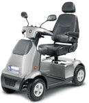 Front Left Side View Of The AFIKIM Afiscooter C4 Scooter Shown In The Dark Gray Color