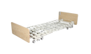 Front Left Side View Of The Emerald Oasis Hi Low Adjustable Bed Shown In Low Height Flat Position