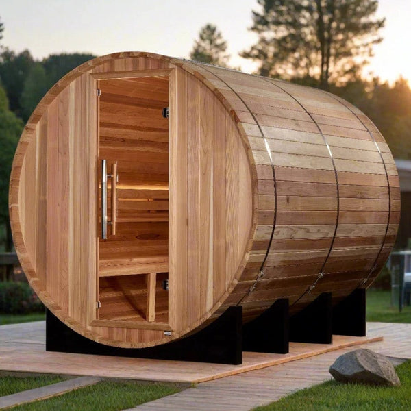 Front Left Side View Of The Golden Designs Klosters 6-Person Barrel Sauna | GDI-B006-01 Shown In An Outdoor Setting