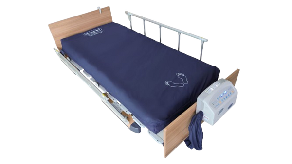Front Left Side View Of The ObboMed OB-2000 StandardAir Alternating Pressure Low Air Loss Mattress Shown In The Flat Position