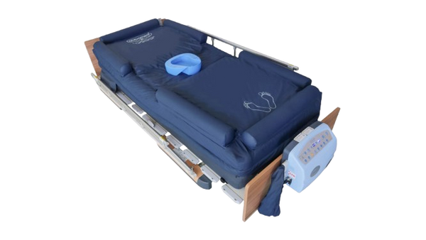 Front Left Side View Of The ObboMed OB-2680 PremiumAir Low Air Loss Mattress with Inflatable Guardrails Shown In The Flat Position