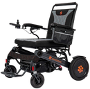 Front Left View Of The Bangeran Mammoth EX Automatic Folding Electric Wheelchair Shown In Black And Orange Color