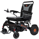 Front Left View Of The Bangeran Mammoth EX Electric Wheelchair Shown With Black And Orange Color