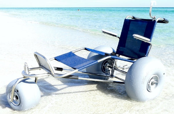 Front Left View Of The Debug Mobility EZ Roller Floating Beach Chair In A Beach Setting