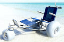 Front Left View Of The Debug Mobility EZ Roller Floating Beach Chair In A Beach Setting