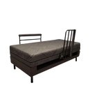 Front Right Side View Of The Customatic Sleep Technologies Independence Rotating Bed In The Flat Position Shown With The Left Side Rail Raised