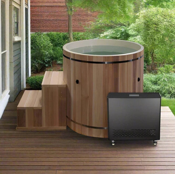 Front Right Side View Of The Dynamic Cedar Cold Plunge Barrel Shown With Steps, Plastic Interior Material, And Chiller In An Outdoor Setting
