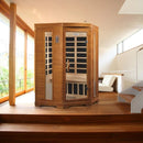 Front Right Side View Of The Dynamic Heming Elite 2-Person Ultra Low EMF FAR Infrared Indoor Corner Sauna | DYN-6225-02 Elite Shown In An Indoor Setting