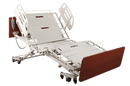 Front Right Side View Of The Emerald Infinity Max UltraWide Expandable Homecare Bed Shown In The Chair Position With Two Soft Touch Quarter Rails