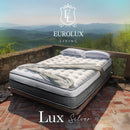 Front Right Side View Of The Eurolux Lux Silver: The 5-Layer Luxury Mattress Crafted By Masters Shown On A Wooden Platform Bed Frame In An Outdoor Setting With Eurolux Living Lux Silver Text