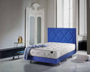 Front Right Side View Of The Eurolux Natur: The 6-Layer Luxury Mattress Crafted By Masters Shown On A Blue Bed Frame In A Luxury Bedroom Setting