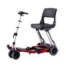 Front Right Side View Of The FreeRiderUSA Luggie Standard Folding Mobility Scooter Shown In The Red Color
