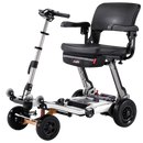 Front Right Side View Of The FreeRiderUSA Luggie Super Plus 4 Folding Mobility Scooter Shown In The Titanium Silver Color