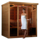 Front Right Side View Of The Golden Designs Monaco 6-Person Near Zero EMF Far Infrared Indoor Sauna |  GDI-6996-01 Shown With An Attractive Woman Standing By The Door