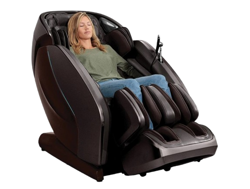 Front Right Side View Of The Kyota Hatsumei M900 AI 4D Massage Chair In Dark Brown Color Shown With Woman Sitting In The Chair