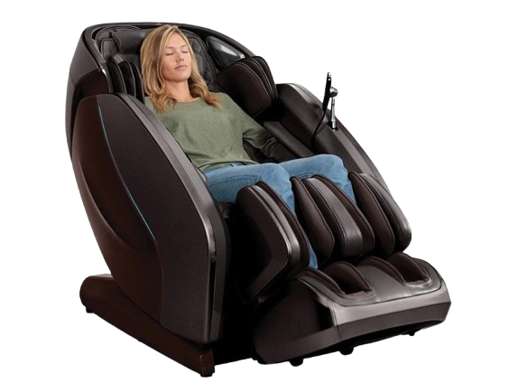 Front Right Side View Of The Kyota Hatsumei M900 AI 4D Massage Chair In Dark Brown Color Shown With Woman Sitting In The Chair