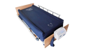 Front Right Side View Of The ObboMed OB-2600 Advanced Low Air Loss Alternating Pressure Mattress Shown In The Flat Position