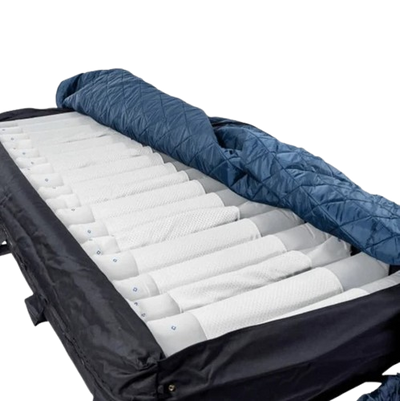 Front Right Side View Of The Prius Duet Mattress System Shown With The Cover Slightly Removed Revealing The Cells Of The Mattress