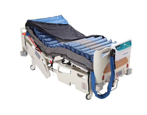 Front Right Side View Of The Proactive Medical Protekt Aire 8900 Low Air Loss/Alternating Pressure And Pulsation Mattress System With "On Demand Side Air Bolsters" Shown With Cover Slighly Removed While Lying On An Adjustable Hospital Bed With Control Unit Hanging On The Footboard
