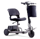 Front Right Side View Of The Reyhee Triad Compact Folding Electric Mobility Scooter Shown With The Gun Metal Colored Frame