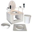Front Right Side View Of The Throne Buttler Powered Lift Commode Chair TLCE001 Shown With Bucket, Lip Cover And Bottom Platform