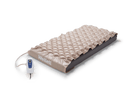 Front Right Side View Of The Wellell Domus 1 Alternating Pressure Redistribution Mattress Shown With Control Unit