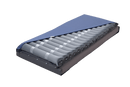 Front Right Side View Of The Wellell Domus 2 Alternating Pressure Redistribution Mattress Shown Without Control Unit With Cover Slightly Removed