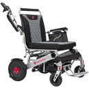 Front Right View Of The Bangeran Mammoth EX Automatic Folding Electric Wheelchair Shown In Silver And Red Color With Right Hand Armrest Raised