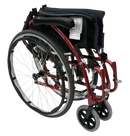 Front Right View Of The Karman S-Ergo 125 Wheelchair Shown With Red Frame In The Folded Position