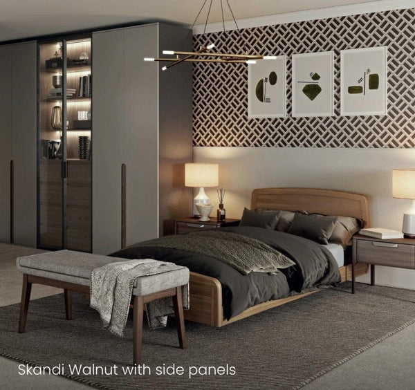 Front View Of The Accora Empresa 12-Function Hi Low Adjusting Nursing Bed Shown In Skandi Design With Oak Wood Finish In A Homecare Setting