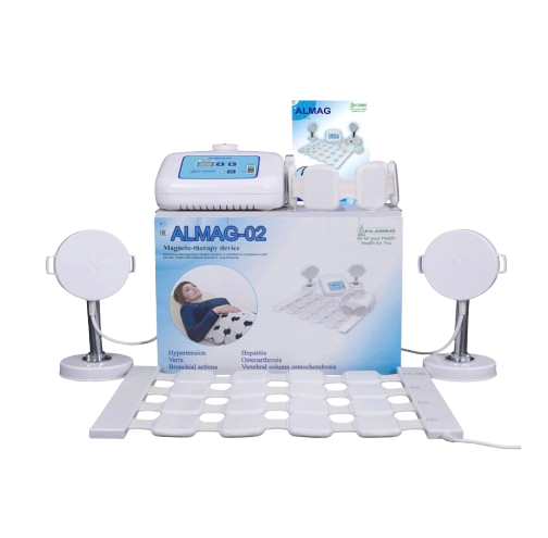 Front View Of The Almagia International ALMAG-2 PEMF Therapy Device Set With A White Electronic Unit, Two Circular Pads On Stands, A Grid Mat, And The Product Box