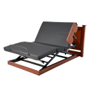 Front View Of The Assured Comfort Platform Hi Low Adjustable Bed In The Elevated Height Position And Articulation With Side Rail, Headboard In Raised Panel Style In Cherry Finish