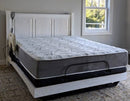 Front View Of The Assured Comfort Signature Hi Low Adjustable Bed In Flat Height Position With Mattress And One Side Rail Shown In White Finish With Raised Panel Headboard 
