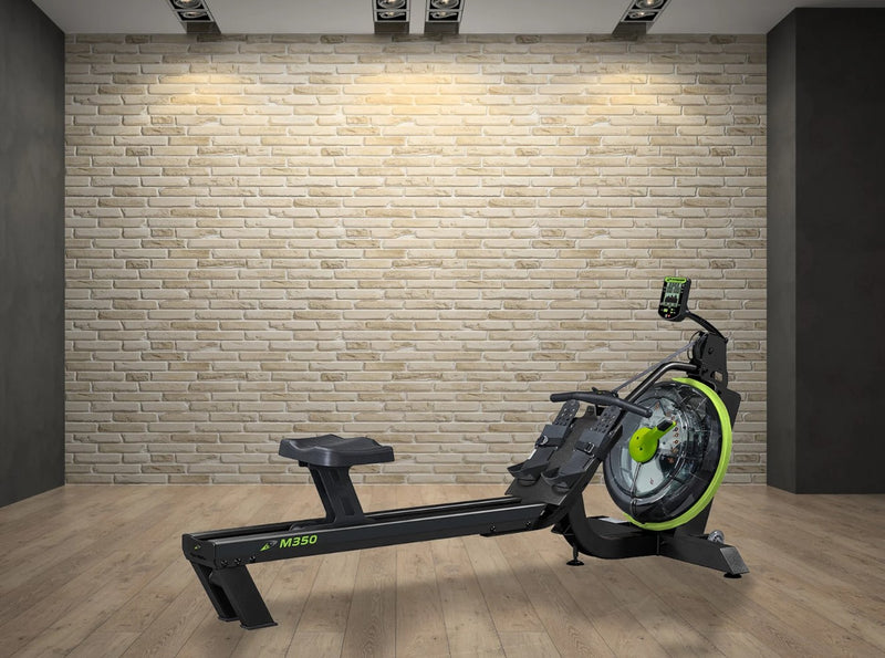 Front View Of The Dynamic Fluid Fitness M350 Rower In A Gym Setting