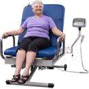 Front View Of The Med Mizer UpScale Adjustable Treatment Table With Scale And Elderly Woman Sitting 