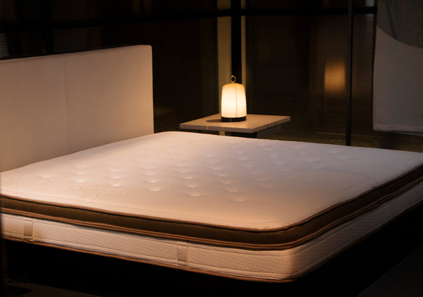 Left Side Overhead View Of The Eurolux Lux By Naturalia: The 6-Layer Luxury Mattress Crafted By Masters Shown On A Bed Frame In A Bedroom Setting