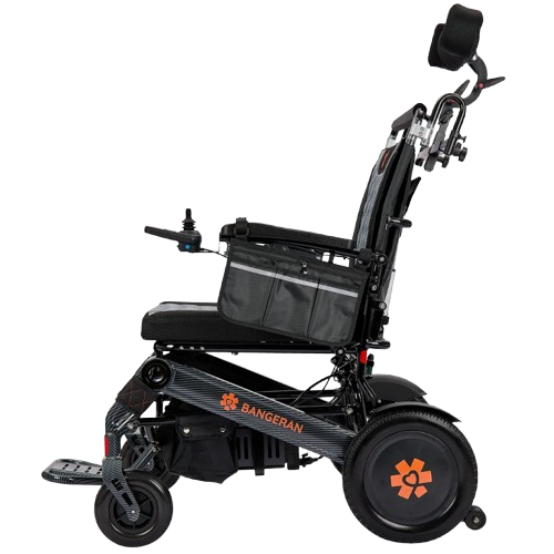 Left Side View Of The Bangeran Mammoth EX Automatic Recline Electric Wheelchair Shown In Black And Orange Color 