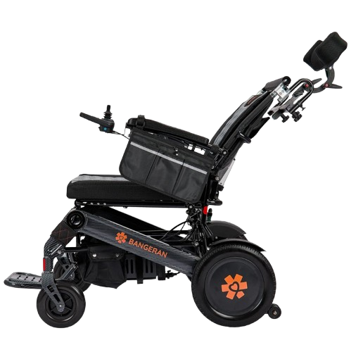 Left Side View Of The Bangeran Mammoth EX Automatic Recline Electric Wheelchair Shown In Black And Orange Color In The Reclined Position