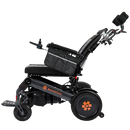 Left Side View Of The Bangeran Mammoth EX Automatic Recline Electric Wheelchair Shown In Black And Orange Color In The Reclined Position
