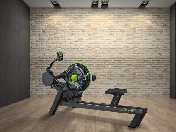 Left Side View Of The Dynamic Fluid Fitness M550 Rower In A Gym Setting