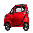 Left Side View Of The Green Transporter Q Runner Express Enclosed Mobility Scooter Shown In Red Color