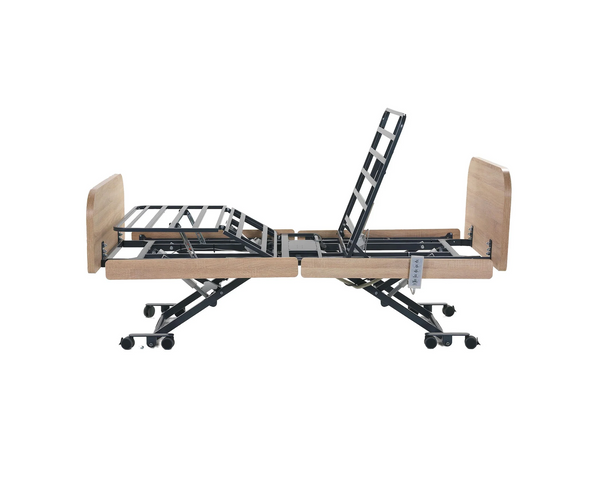 Left Side View Of The Nitrocare Miranda 7410 Hi Low Adjustable Bed In The Slightly Raised Position With The Head Portion In The Fully Articulated Position Without Mattress