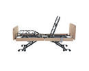Left Side View Of The Nitrocare Miranda 7410 Hi Low Adjustable Bed In The Slightly Raised Position With The Head Portion In The Fully Articulated Position Without Mattress