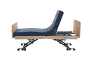Left Side View Of The Nitrocare Miranda 7410 Hi Low Adjustable Bed In The Slightly Raised Position With The Head Portion In The Fully Articulated Position