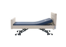 Left Side View Of The Nitrocare Miranda Hi Low Adjustable Bed Shown In The Slightly Raised Position With The Head Portion Of The Frame In The Slightly Raised Position