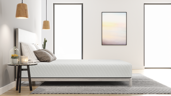 Left Side View Of The Skyward Medical Summit 10" Medium Firm Memory Foam Mattress On A Bedframe In A Bedroom Setting