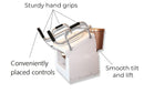 Left Side View Of The Throne Buttler Powered Toilet Lift Chair With Heated Bidet Seat TLFE004 Shown In The Raised Position Over A Brown Toilet Bowl Highlighting The Sturdy Hand Grips, Smooth Tilt And Lift, And Conveniently Placed Controls